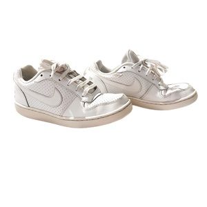 Worn white Nike air forces. I’m size 5